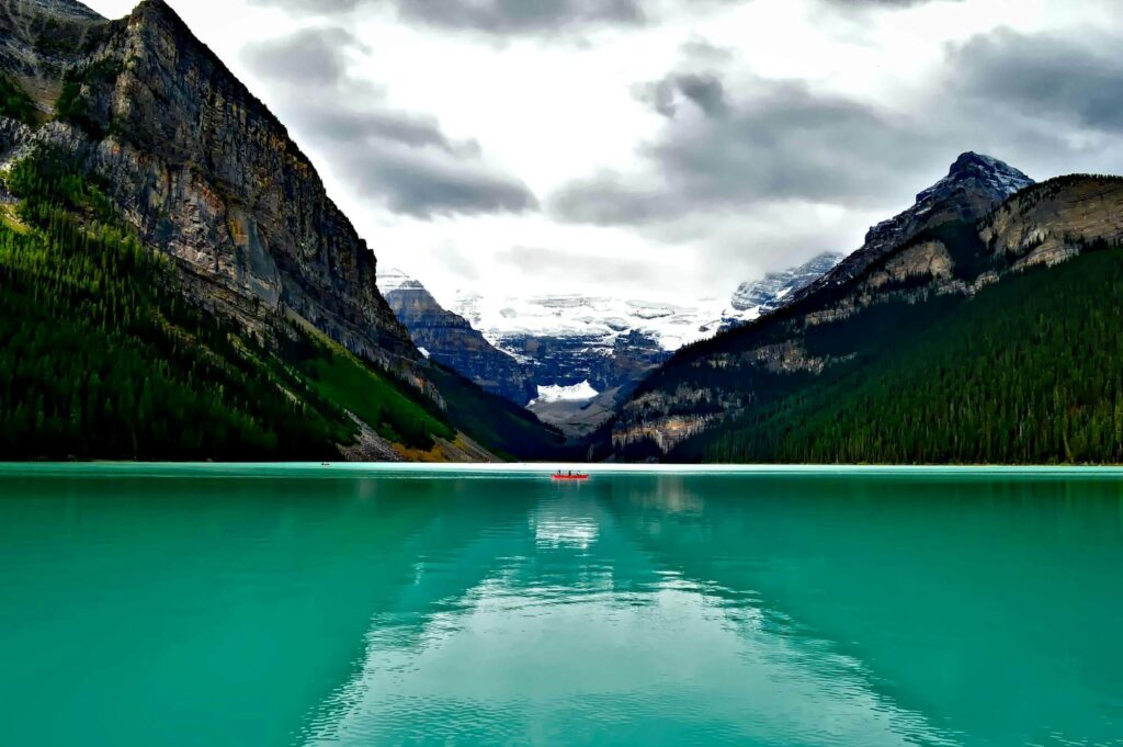 body of water surrounded by mountains